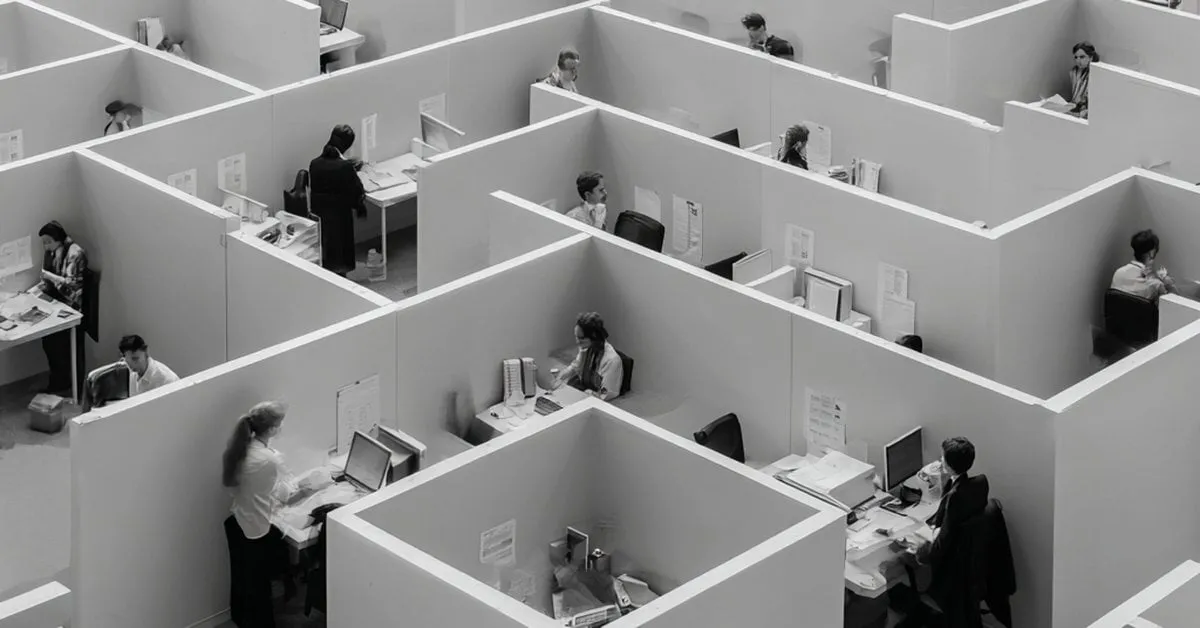 Multiple teams working independently on security without unified leadership, illustrating the cost of not having a CISO from IOmergent fractional CISO services.