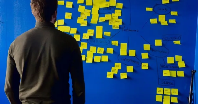 AI startup team evaluating security requirements for enterprise customers, from IOmergent fractional CISO services.